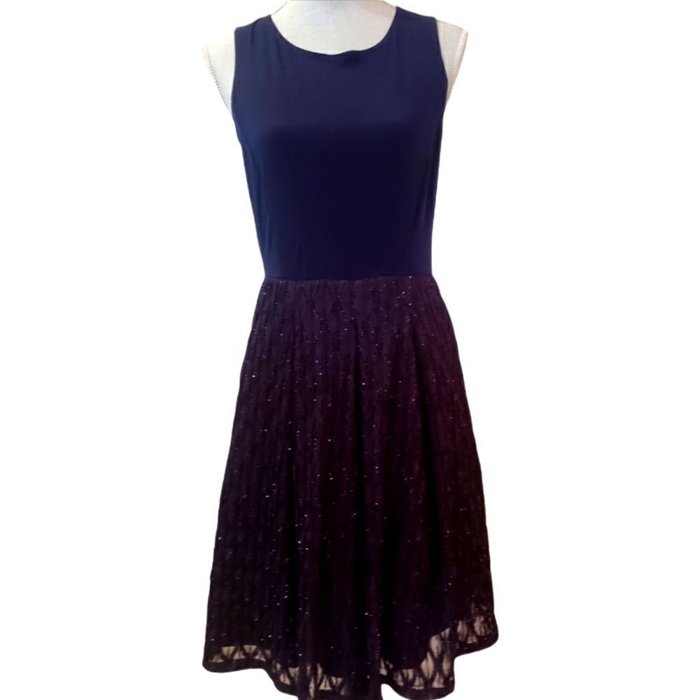 Karen Steven's sleeveless lace over